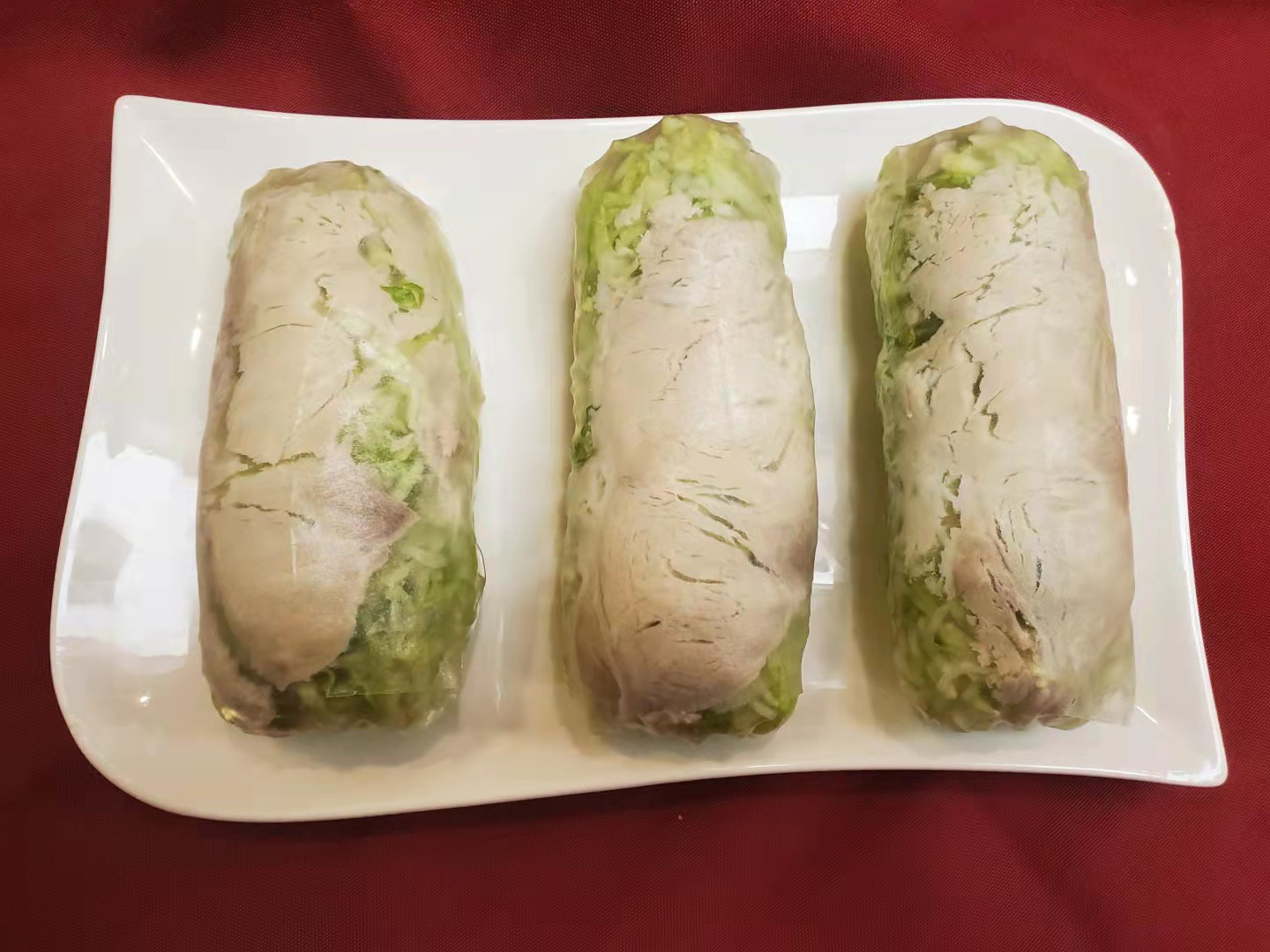 3. Pork Salad Rolls (3 rolls. Extra roll $3.75)